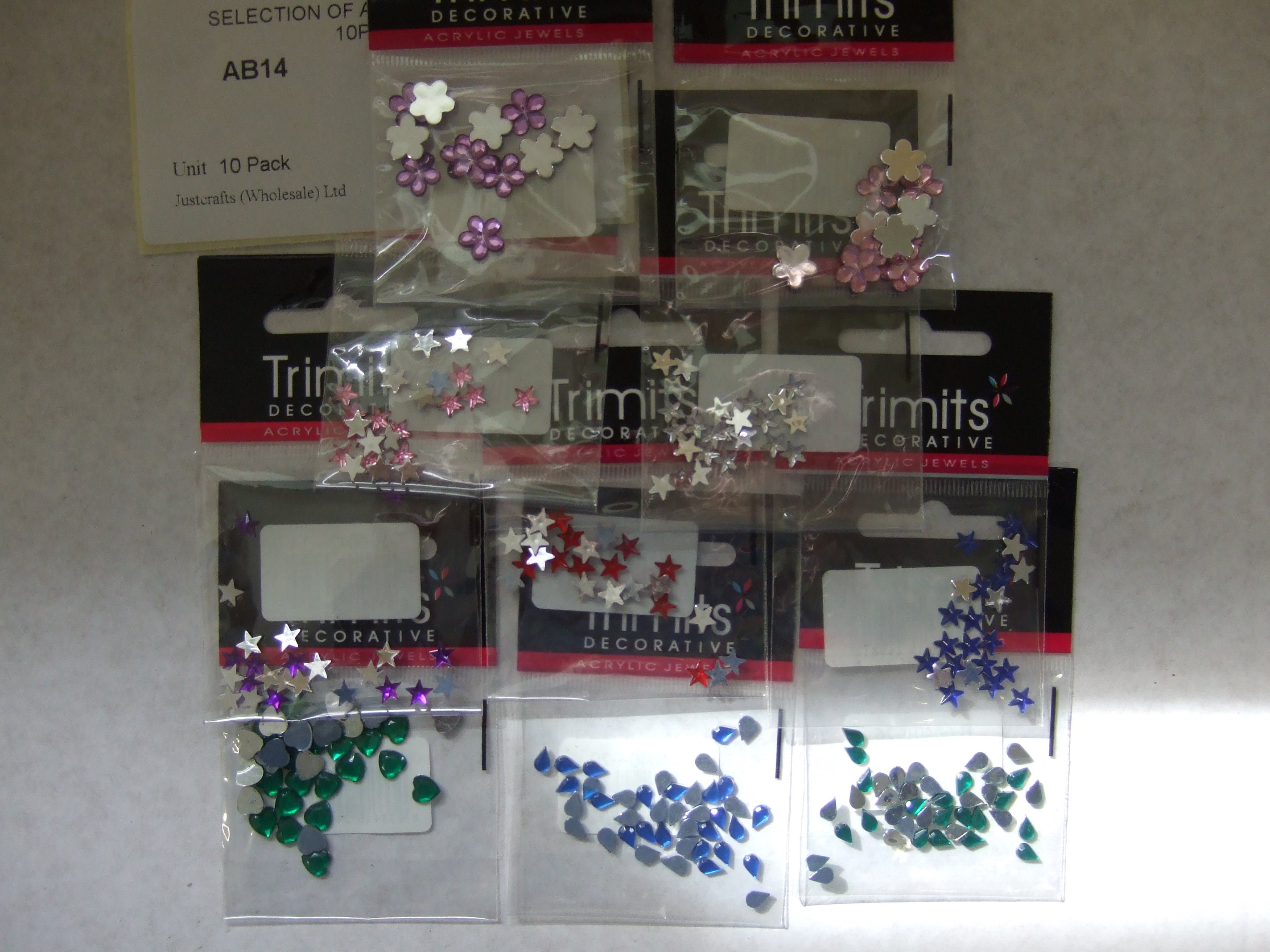 AB14  SELECTION OF ACRYLIC STONES X 10 PACKS