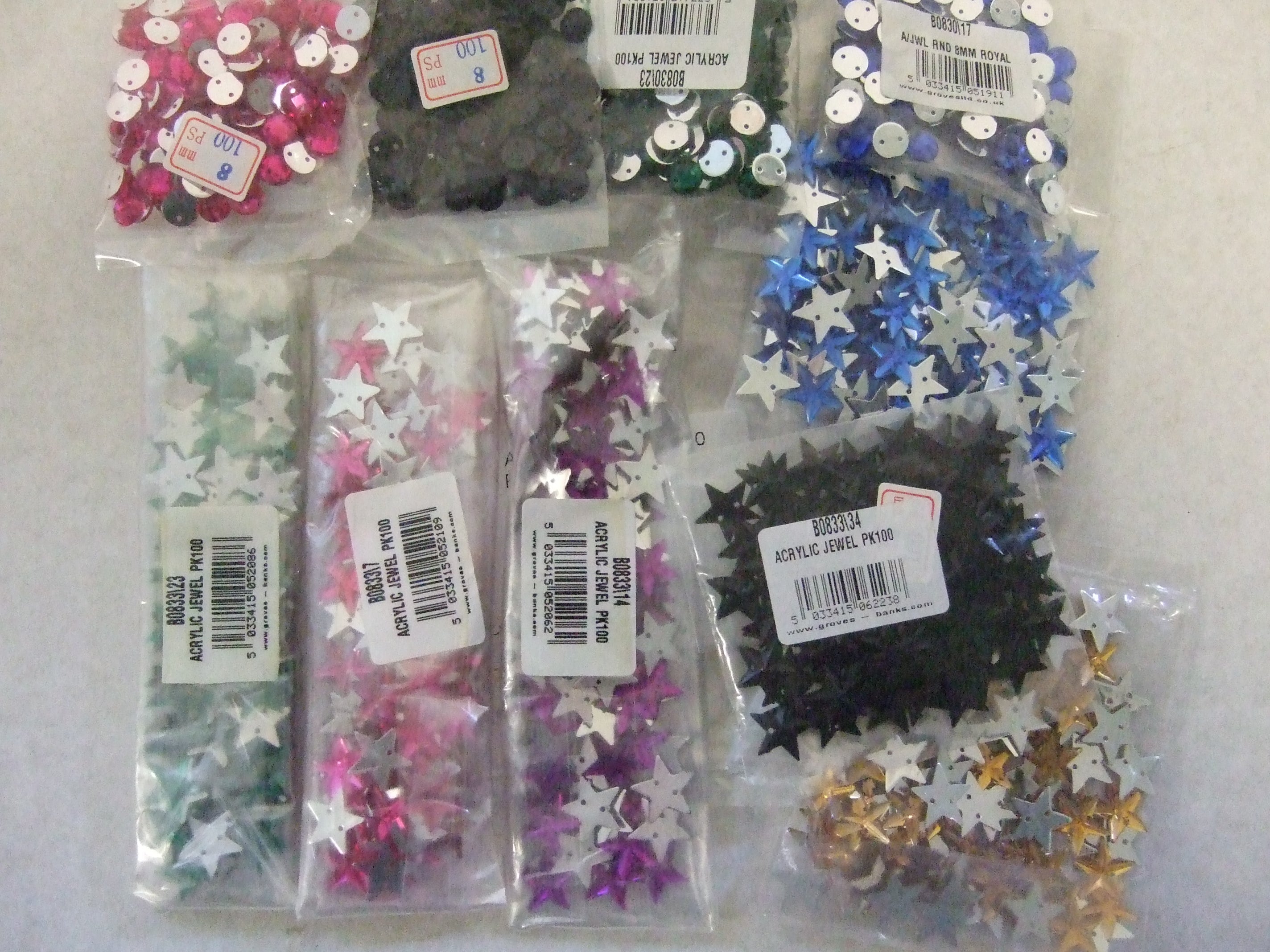 AB131  SELECTION OF ACRYLIC STONES X 10 PACKS