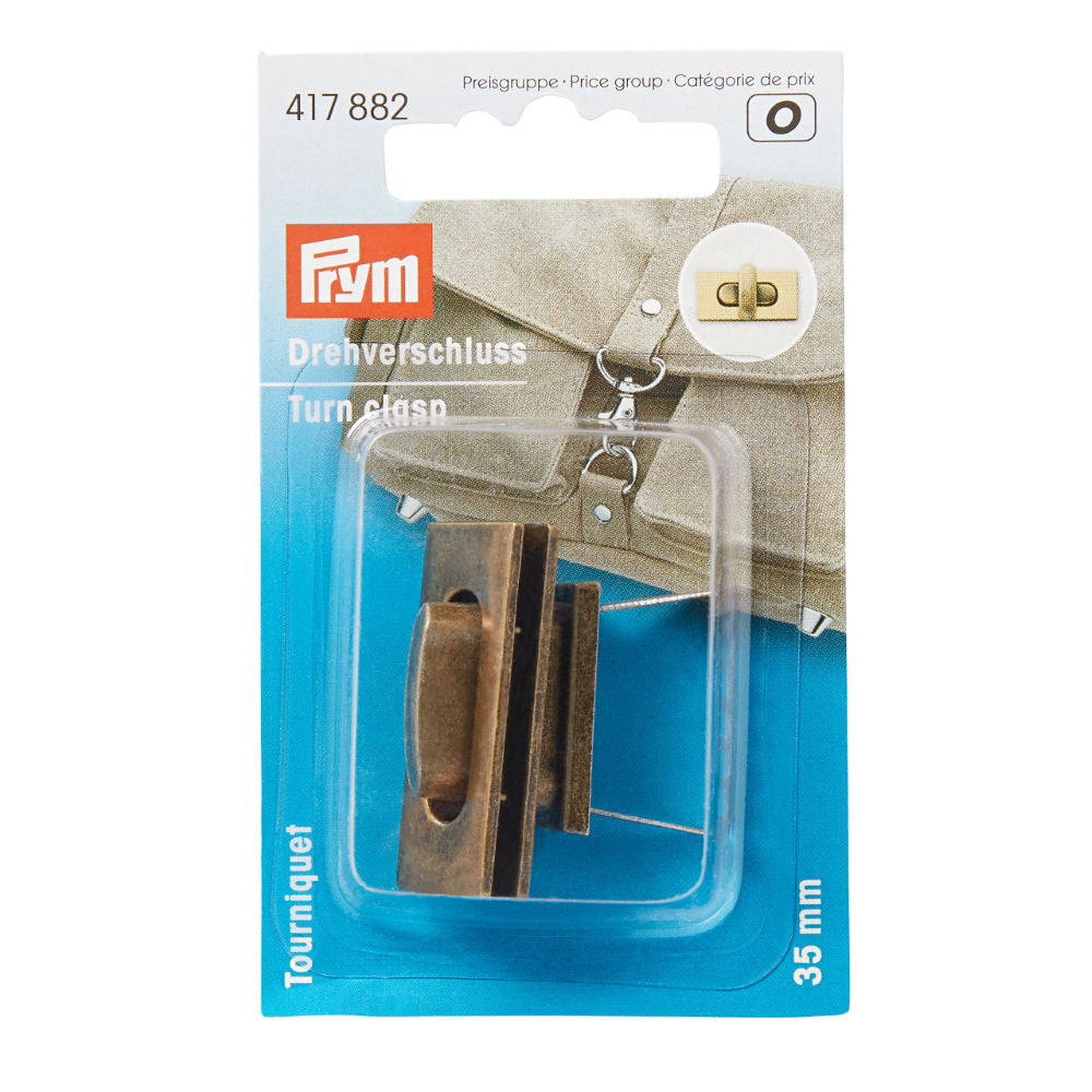 P417882 - Turn clasp for bags antique brass brushed x 1pc