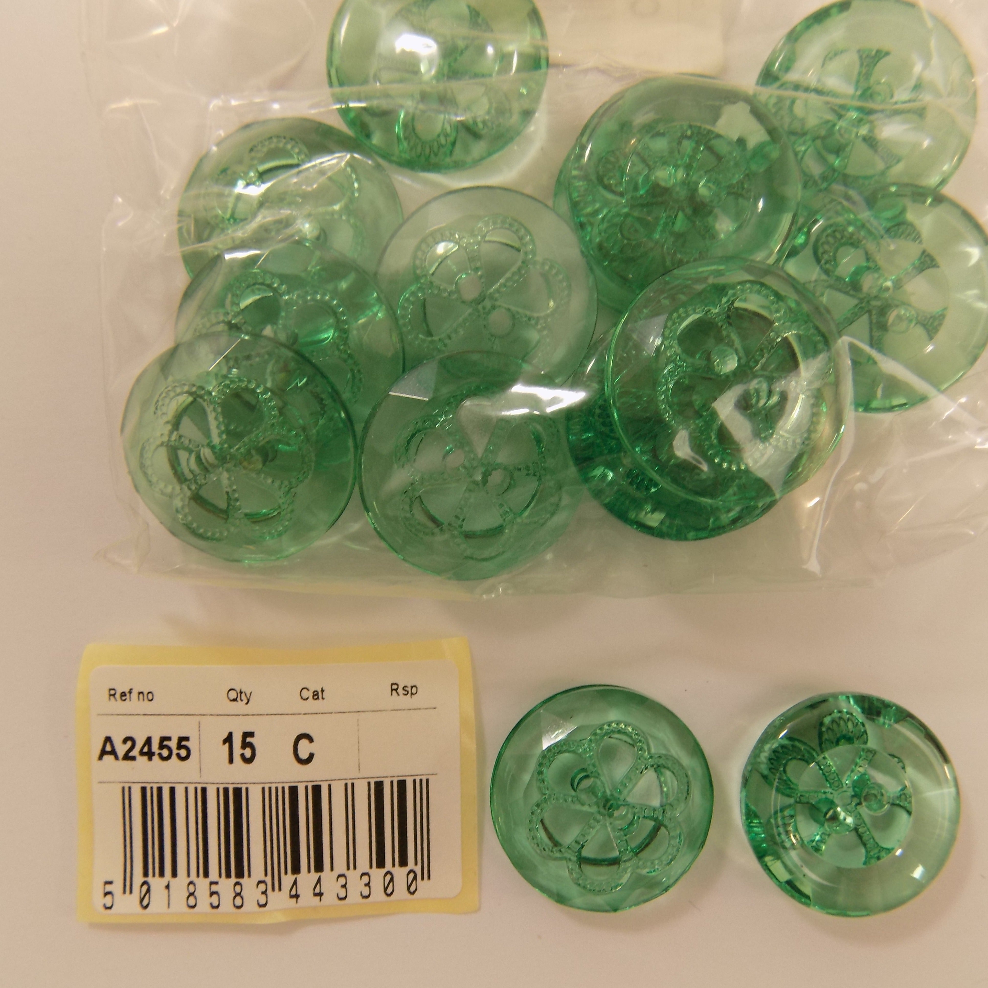 S2455  **SEHLBACH C BUTTON 22MM 2H CLEAR GREEN PK15