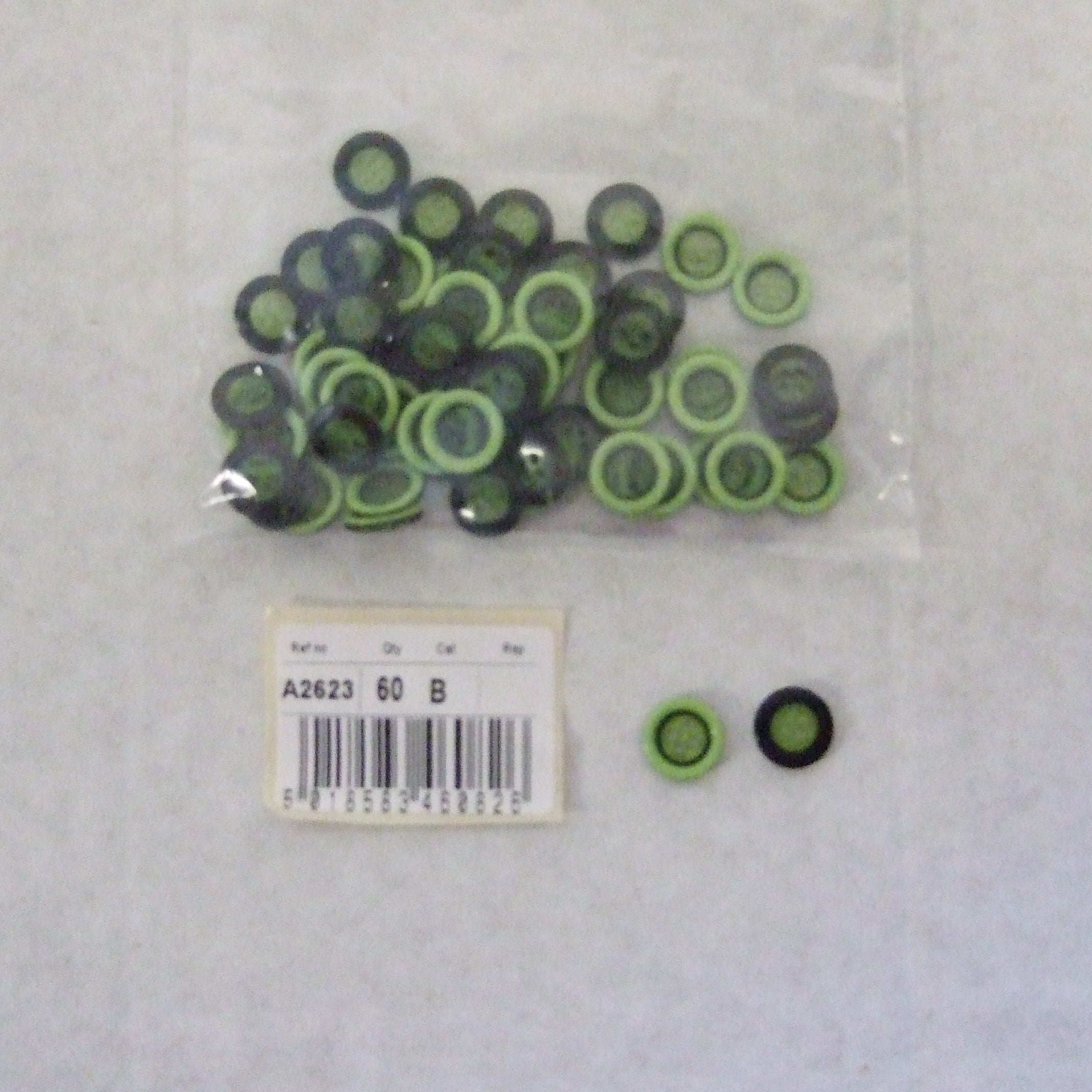 S2623  **SEHLBACH B BUTTON RAISED RIM LIME PK60