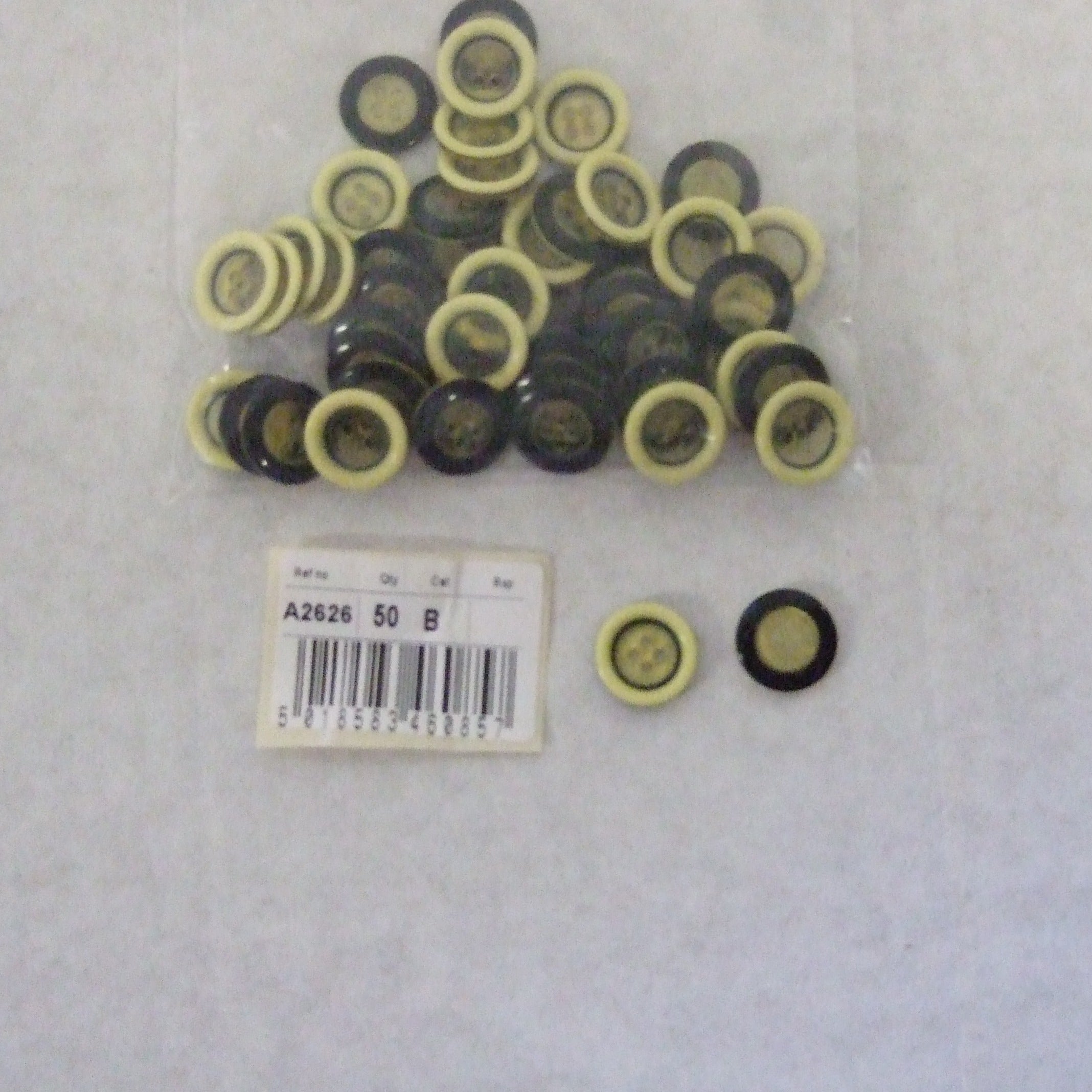 S2626  **SEHLBACH B BUTTON RAISED RIM YELLOW PK50