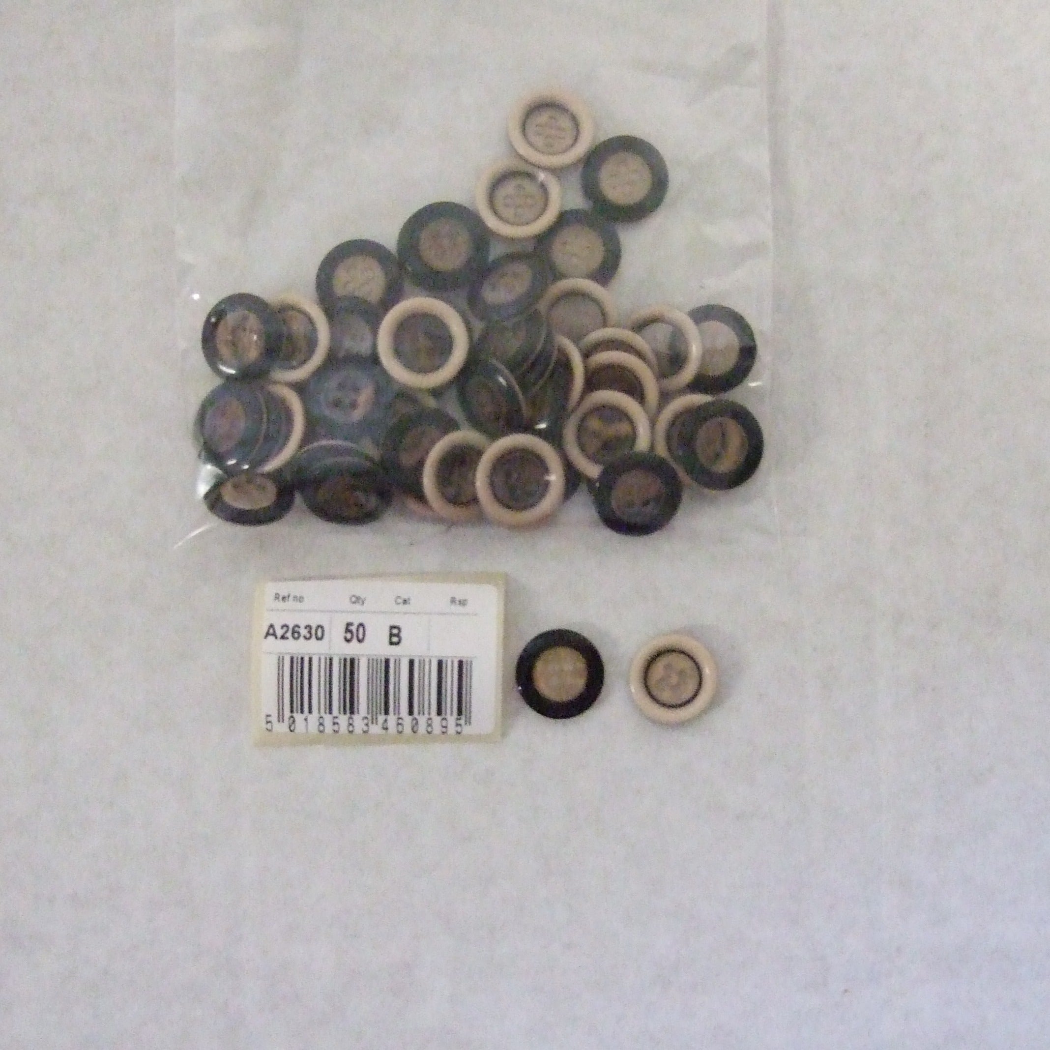 S2630  **SEHLBACH B BUTTON RAISED RIM BEIGE PK50