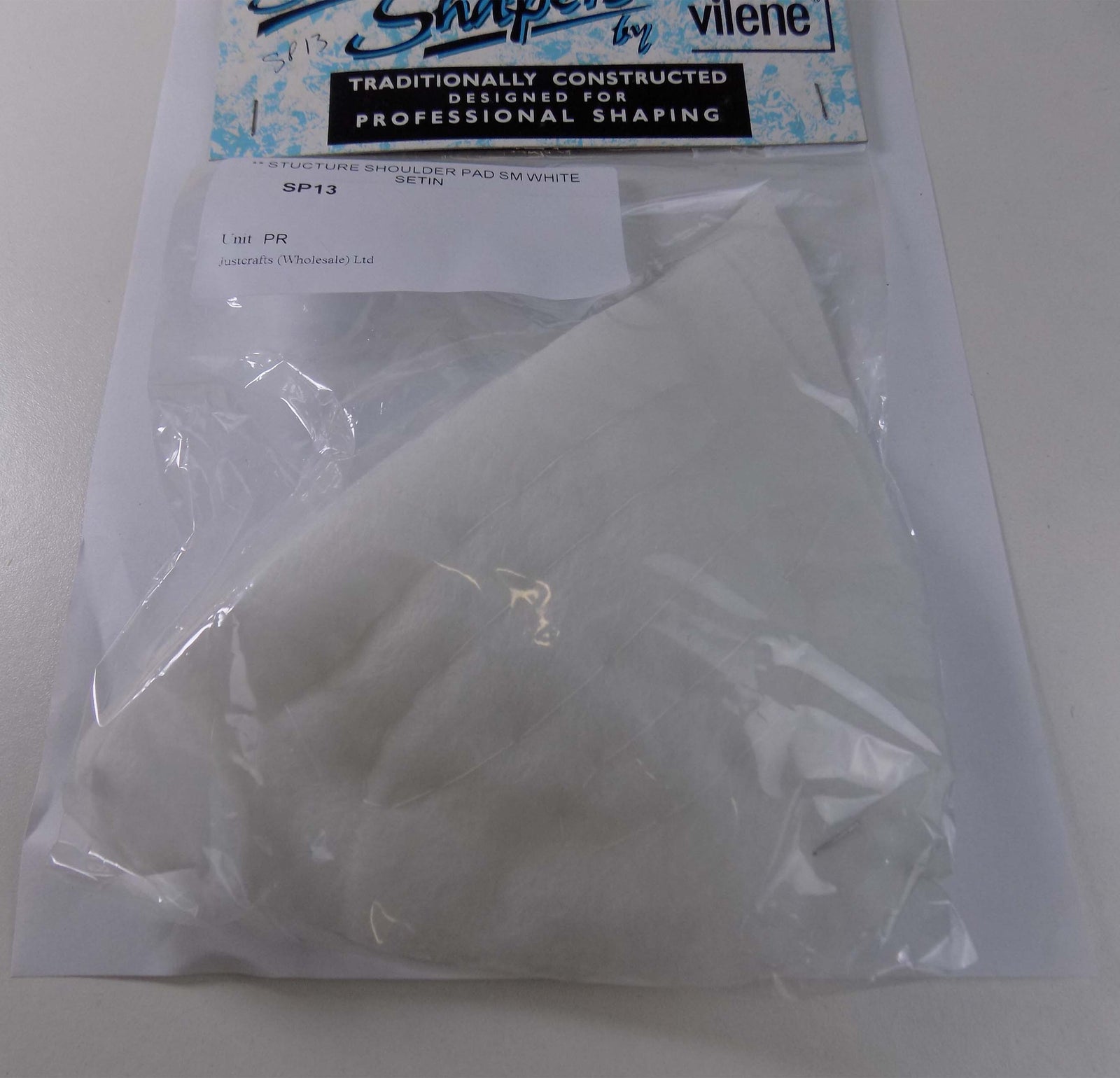 SP13 - **STUCTURE SHOULDER PAD SM WHITE SETIN