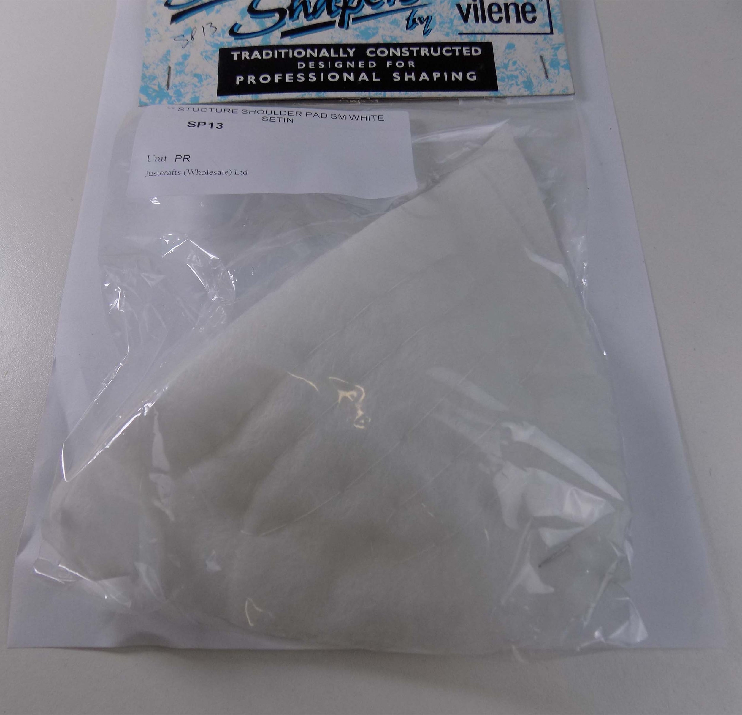 SP13 - **STUCTURE SHOULDER PAD SM WHITE SETIN